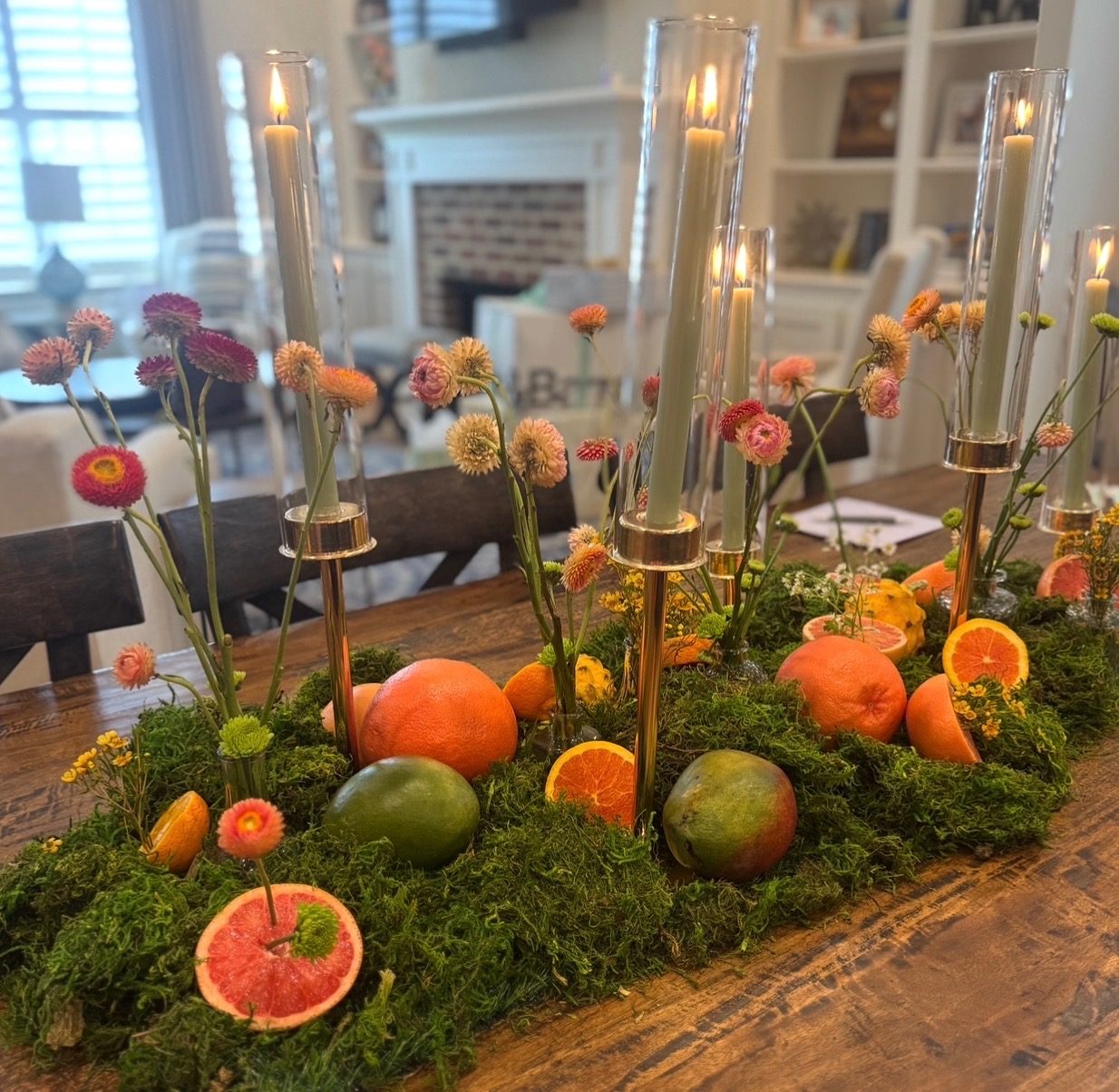 Citrus and candle centerpiece with dried florals